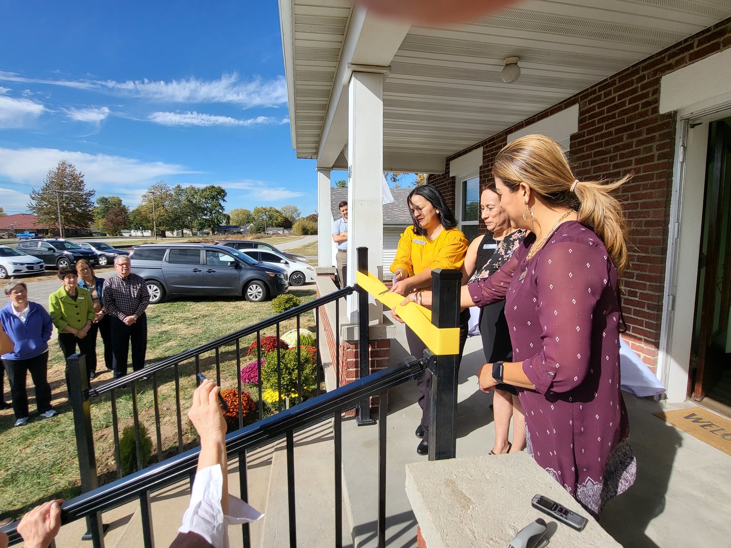 Parishioners, board members, volunteers and friends of El Puente Hispanic Ministry gather outside the extensively renovated Annunciation Rectory in California to bless and dedicate El Puente’s new location there.